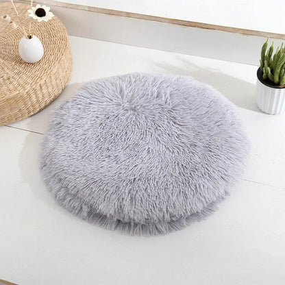 Coussin rond douillet pour chat