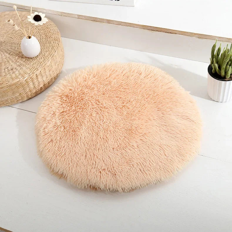 Coussin rond douillet pour chat