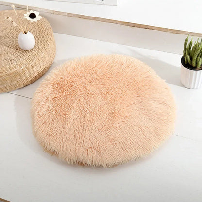 Coussin rond douillet pour chat