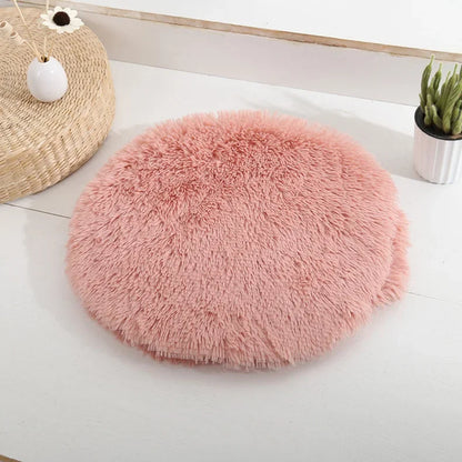 Coussin rond douillet pour chat