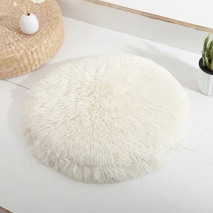 Coussin rond douillet pour chat