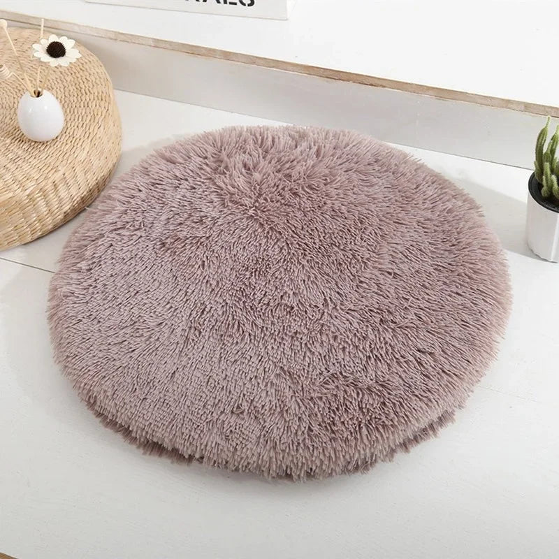 Coussin rond douillet pour chat