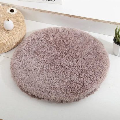 Coussin rond douillet pour chat