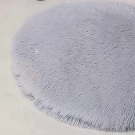 Coussin rond douillet pour chat